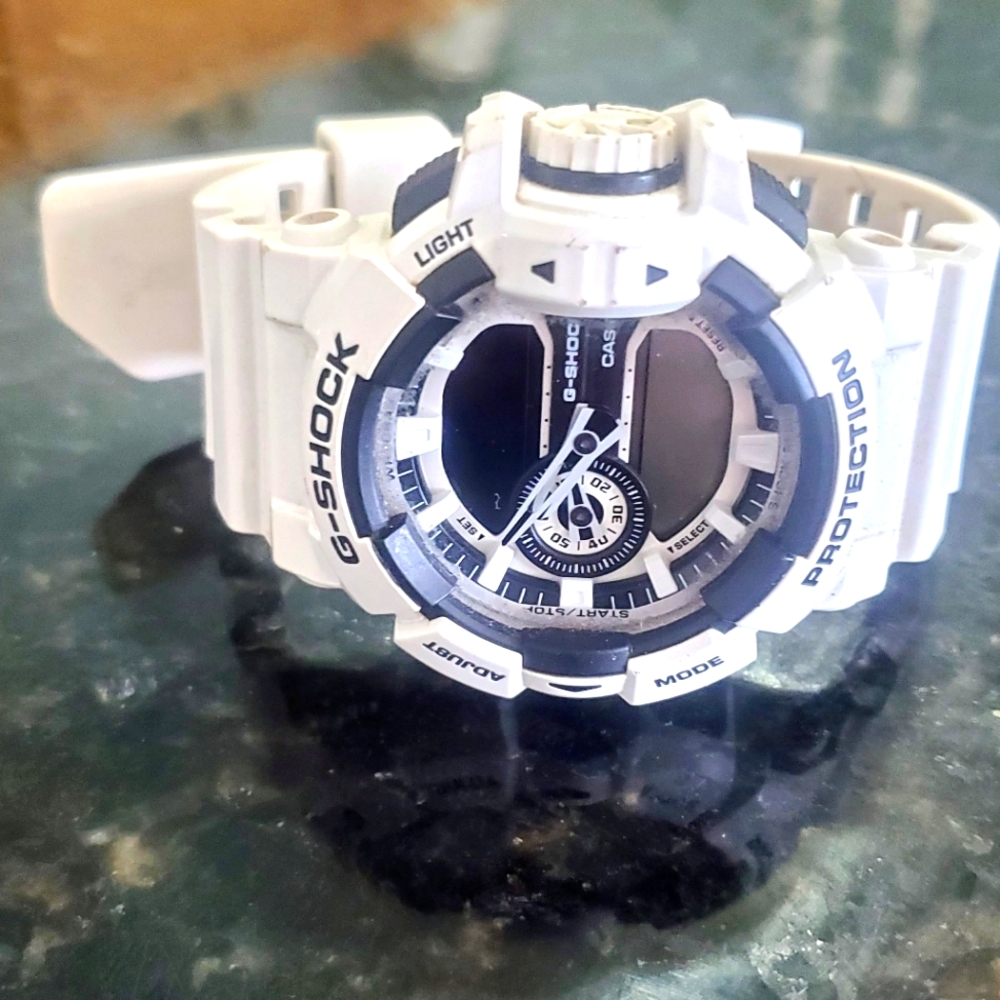 White and Black GShock by Casio men's watch